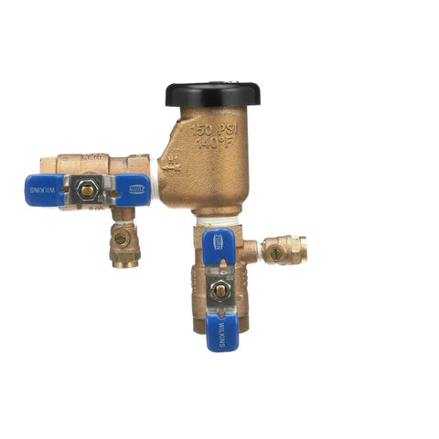 Brass 3/4-inch pressure vacuum breaker irrigation assembly with blue Wilkins shutoff valves and a black top cap