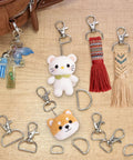 Badass Swivel Snap Hooks And D Rings Set Keychain Clips Lobster Claw Clasps for Paracord Rigging with colorful keychains.