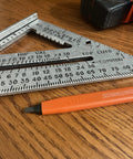AlwaysSharp Refillable Mechanical Carpenter Pencil Two Pack With Eight Replacement Black Graphite Tips And Pocket Clip on wood surface