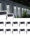 12 Pack Solar Fence Lights With Four LEDs, Waterproof Outdoor Deck Stairway Pathway Garden Lighting, shown on a fence.