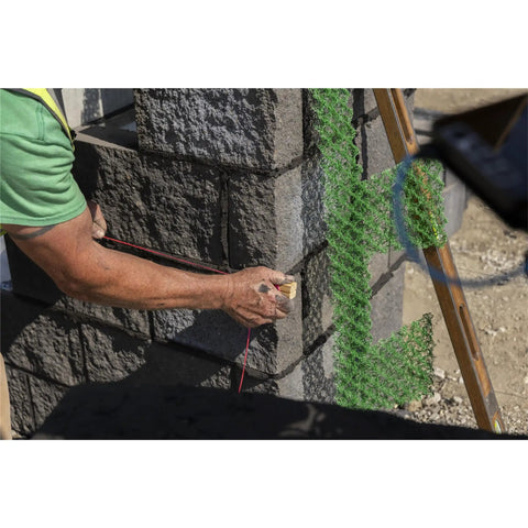 Person using Heavy Duty Mason Line For Pros Bonded Nylon Braided 500 Foot String Line In Yellow And Black for masonry project