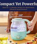 Man holding Super Fast Boil Electric Glass Kettle 1.2L 1200W with mint finish on a kitchen counter, measuring 8.25" by 8.7".