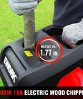 Heavy Duty 15 Amp Wood Chipper Shredder Mulcher With 1.77 Inch Cutting Capacity in action with a branch being processed