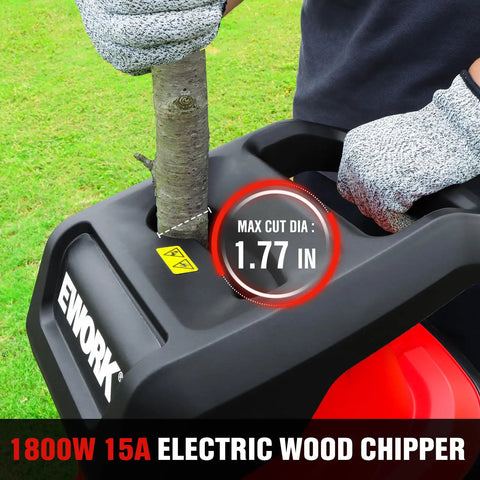 Heavy Duty 15 Amp Wood Chipper Shredder Mulcher With 1.77 Inch Cutting Capacity in action with a branch being processed