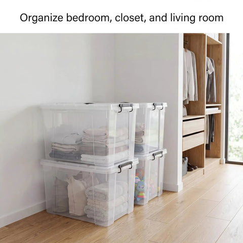 Straight Up Premium Clear Storage Bins With Secure Seal Lids And Heavy Duty Handles For Game Changing Closet Organization Plus No Sweat Home Office And Garage Solutions stacked in a corner, filled with folded towels.