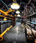 10 Head LED Temporary Construction Lights illuminating an industrial tunnel with pipes and fixtures, 100W total, 10000 lumens
