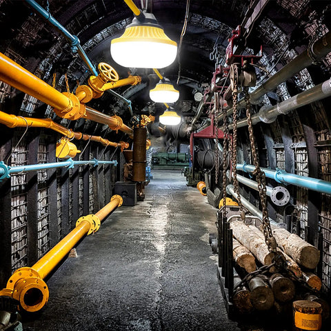 10 Head LED Temporary Construction Lights illuminating an industrial tunnel with pipes and fixtures, 100W total, 10000 lumens