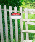 Warning Portable First Aid Sign Aluminum 8x12 Inch Wall Art Safety Plaque on wooden fence in outdoor setting