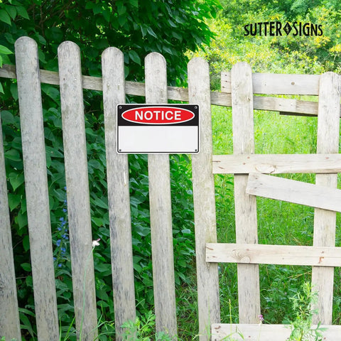 Warning Portable First Aid Sign Aluminum 8x12 Inch Wall Art Safety Plaque on wooden fence in outdoor setting