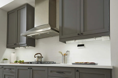 Modern kitchen with Under-Cabinet USB Outlet Module in white with dual USB ports delivering 3.1A total, integrated in modular track.