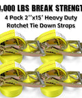 Four yellow 2x15 ft heavy-duty ratchet tie down straps, showing hooks and ratchet mechanism, 10,000 lbs break strength.
