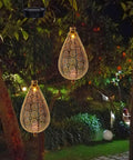 2 Pack Solar Hanging Lanterns With Raindrop Shape, Warm White LED Glow illuminating garden at night, Retro Iron Antique Bronze Finish