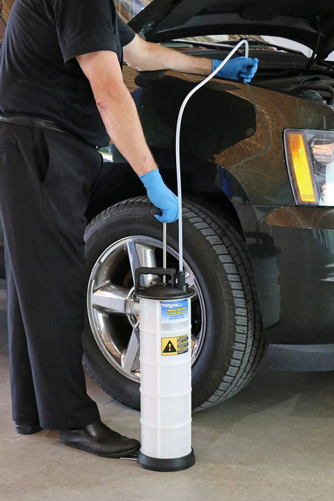 Slick Manual Fluid Evacuator Pump For Muscle Cars And Street Rods With No Hassle Oil Drain and Brake Fluid Extractor in use.
