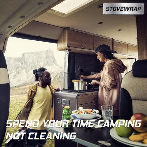Two people in an RV kitchen using stove with Stove Cover Protector And Oven Liner For Atwood Dometic Triangle 3 Burner Stoves Only Precut For Quick Cleanup Heat Resistant Nonstick Washable Reusable Long Lasting Kitchen Accessory.