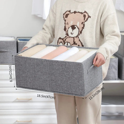 Person holding foldable closet organizer bins for clothes, reinforced handle, thick fabric storage with built in PP, 18.5x11.02x8.27 inches