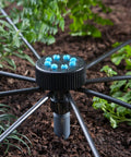 Eight Outlet Adjustable Bubbler For Drip Irrigation Systems Turns Underground Lines Into Precise Micro Drip Watering, installed in garden