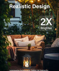 Solar Outdoor Lanterns Waterproof 14 Inch Two Pack With LED Flickering Flameless Candles in patio setting with furniture