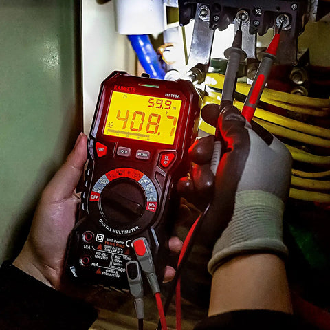 Digital Multimeter TRMS 6000 Counts Auto Ranging Voltmeter For Voltage Current Resistance Diodes Continuity Capacitance Temperature Frequency Duty Cycle And More Ready For Auto Techs And DIYers in use checking voltage on wires.