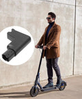 Man riding scooter beside Electric Scooter Dashboard Base Riser Kit With Upper Pressure Block Switches And Panel Mount for 30 Model Scooters