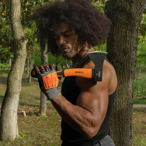 Person holding Compact Outdoor Camp Hatchet For Splitting And Kindling Wood With Forged Steel Blade in forest setting