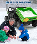 Children playing in snow with 24V Dual Motor 2 Seater Ride On Dump Truck For Big Kids, 5 MPH Electric Kids Truck shown in background