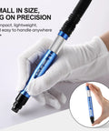 One Eighth Inch Pneumatic Pencil Die Grinder Running Sweet At 56000 Rpm Air Drive For Crushing Burrs And Top Shelf Metal Finishing Rig Built High Precision Handheld Micro Grinding Tool held in gloved hand for detailed work.