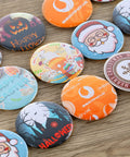 Assorted holiday-themed badges made with DIY Button Maker Kit 32mm Badge Press Machine With 1000 Button Blanks Circle Cutter