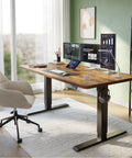 55 By 28 Inch Roomy Electric Standing Desk With A 28 Inch Deep Desktop Sit Stand Home Office Workspace Four Preset Heights Height Adjustable Frame Rustic Brown. Image showing a home office setup with monitors and accessories.