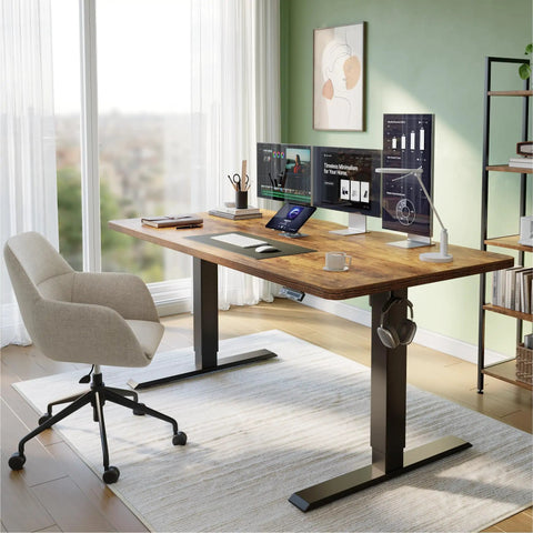55 By 28 Inch Roomy Electric Standing Desk With A 28 Inch Deep Desktop Sit Stand Home Office Workspace Four Preset Heights Height Adjustable Frame Rustic Brown. Image showing a home office setup with monitors and accessories.