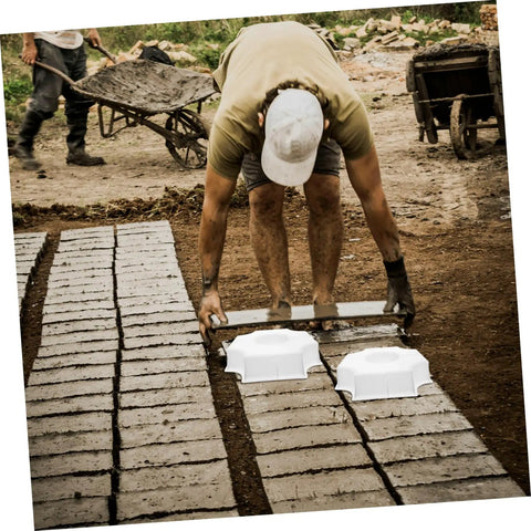 Worker using Medium Hole Tiles Concrete Mold For Stepping Stones, Reusable DIY Garden Path And Patio Paver Maker, 10.62 X 10.62 X 2.36 In