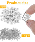 100 Pcs Tiny Silver Hinges For Crafts 10x8mm Mini Hinges with 400 screws shown in hand and pile for jewelry boxes and miniature furniture.