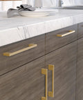 Armadale Collection Champagne Bronze Modern Rectangular Cabinet And Drawer Pull Handle in kitchen setting, 6 5/16" center to center.