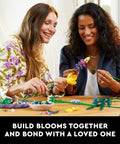 Brick Built Wildflower Bouquet Building Set For Adults Realistic Faux Flowers For Indoor Home Decor Desk Or Kitchen Display Creative Gift Idea For Birthdays And 18 Plus Vase Not Included, two women building blooms