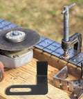 Rock Solid 2 Piece Adjustable Bench Grinder Tool Rest Bracket showing black steel holder on a workbench with grinder