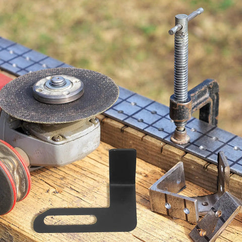 Rock Solid 2 Piece Adjustable Bench Grinder Tool Rest Bracket showing black steel holder on a workbench with grinder