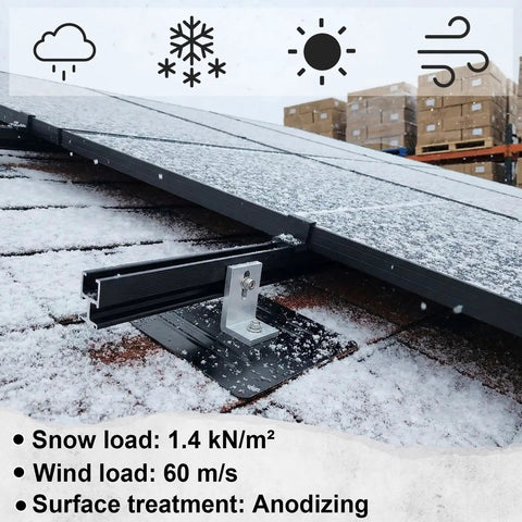 16 Pack Aluminum L Bracket Solar Racking Kit with flashing installed on snowy asphalt shingle roof, visible PV rail.
