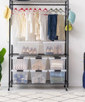 32 Quart Clear Plastic Storage Bins With Easy Snap Lids Stackable Home Organization Totes For Closet Bedroom Garage filled with clothes and shoes.