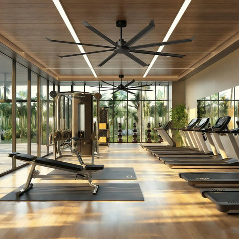 Massive 100 Inch Industrial Ceiling Fan Moves Serious Air Pmsm Motor With 8 Double Layer Aluminum Blades 21000 Cfm High Airflow Hvls Commercial Fan in gym interior.