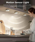 Rechargeable Puck Lights With Remote, Wireless LED Under Cabinet Lighting, illustrating motion sensor activation in kitchen