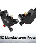Angled front view of DYISLAND LD-200 2-piston hydraulic disc brake calipers for e-bike, black pair with mounting hardware.