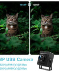 Image comparison of 5MP USB Camera With 180 Degree Fisheye Lens showing 1944P vs 1080P quality with cat in foliage.