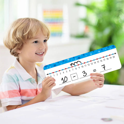 Child holding 26 Pack Number Line Dry Erase Boards Cards Double Sided Writable And Erasable Whiteboards 0 To 10 On One Side