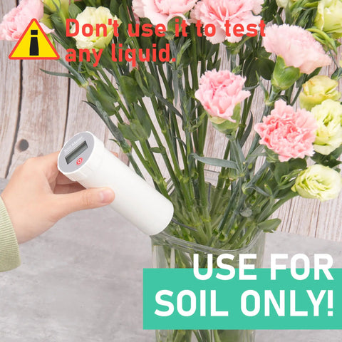 Industrial Grade Soil PH Meter With No Fuss Calibration Free LCD Display used incorrectly in water with flowers.