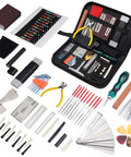 Complete 72-Piece Guitar Tool Kit For Repairs And Setup with strings, wrenches, capos, and cleaning gear displayed on a table.