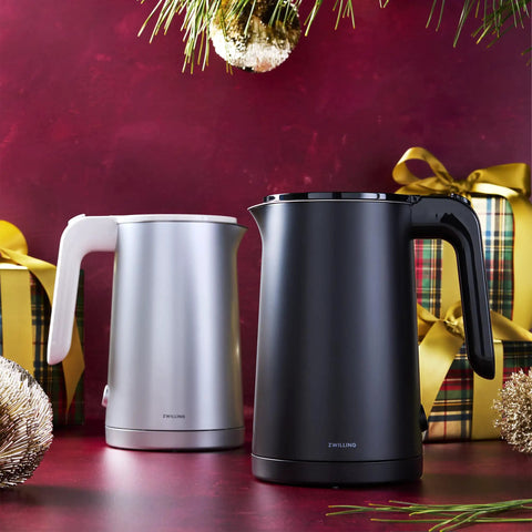Cool Touch 1 Liter Cordless Electric Kettle with Double Wall Stainless Steel Keeps Water Hot Longer and Exterior Cool shown in silver and black