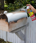 White 14 Oz Waterproof Rubber Spray On Sealant Coating That Stops Leaks Instantly Flexible After Drying Ideal For Gutters Wood RVs Campers Roofs Skylights Windows And More being applied to a metal mailbox.