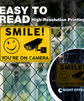 Smile Youre On Camera Signs 10x7 Outdoor Aluminum Notice Signs Single Sided Two Pack For Home Office Garage Yard Private Property Weatherproof Security Signage on chain-link fence