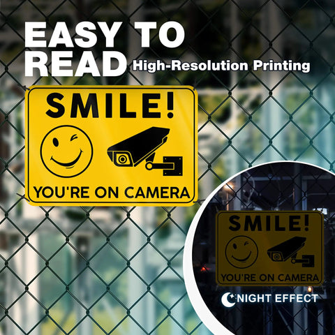 Smile Youre On Camera Signs 10x7 Outdoor Aluminum Notice Signs Single Sided Two Pack For Home Office Garage Yard Private Property Weatherproof Security Signage on chain-link fence