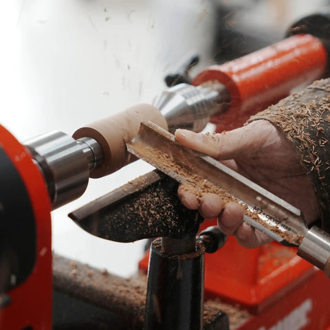 Craftsman using Bottle Stopper Chuck For Lathe Mounting Three Eighths Inch By Sixteen TPI Stoppers for crafting wood stopper