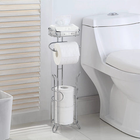 Free Standing Chrome Toilet Paper Holder With Reserve Shelf And Storage Basket next to toilet in bathroom